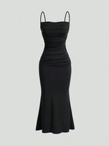 Robe longue noire dos nu à volants