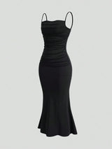 Robe longue noire dos nu à volants