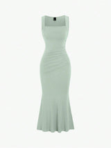 Robe longue sans manches de couleur unie