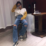 ripped high-rise wide-leg jeans