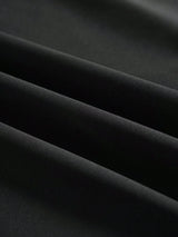 Robe longue noire dos nu à volants