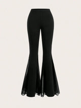 Pantalon évasé fendu extensible