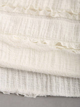 Robe longue ras-du-cou avec anneau à dos-nu et ourlet volanté