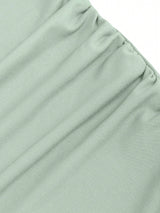 Robe longue sans manches de couleur unie