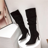 Pointed over the knee high heels